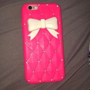 A pink case for iPhone 6/6s with a bow / diamonds
